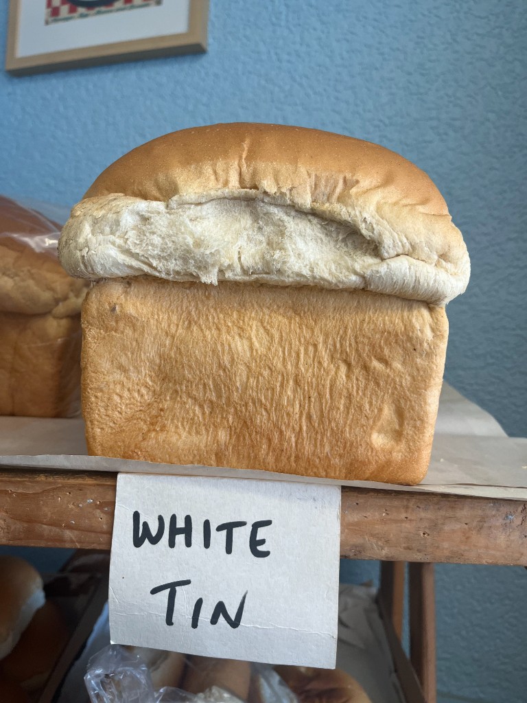 Fresh white tin loaf on the shelf at The Bakery Cafe